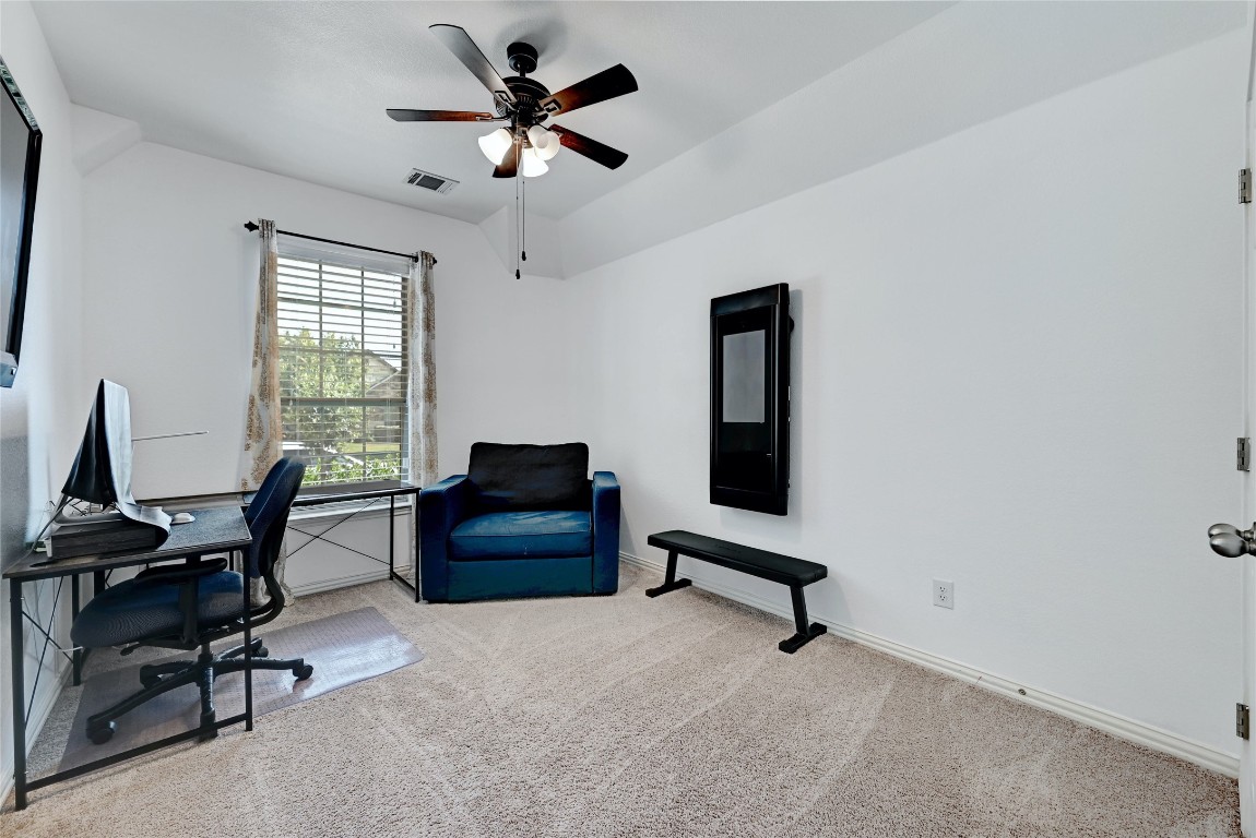 2812 St Paul Rivera Round Rock, TX 78665 - Photo 16 of 28 a view of a livingroom with workspace and a window