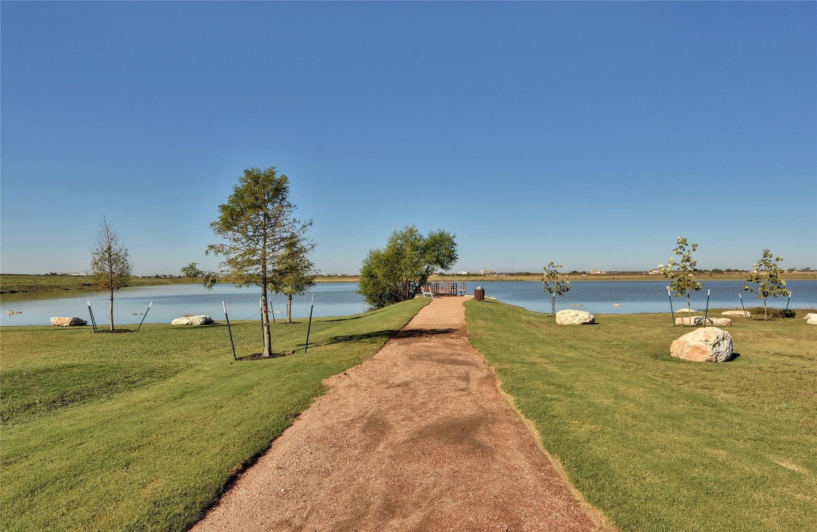 2812 St Paul Rivera Round Rock, TX 78665 - Photo 22 of 28 a view of a swimming pool with an outdoor space