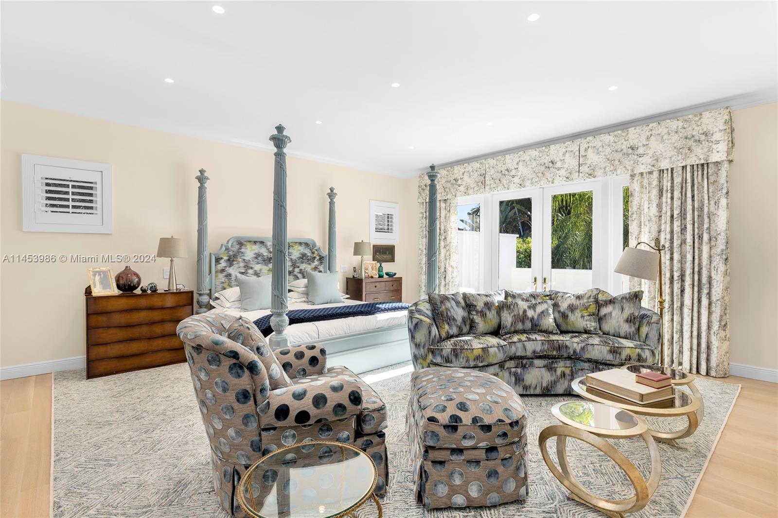 6350 Allison Road Miami Beach, FL 33141 - Photo 17 of 57 a living room with furniture and a large window