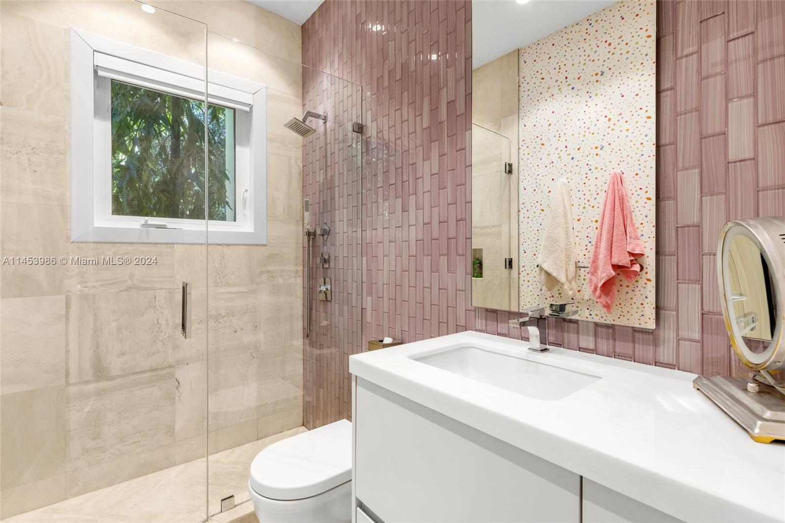 6350 Allison Road Miami Beach, FL 33141 - Photo 33 of 57 a bathroom with a sink toilet and shower