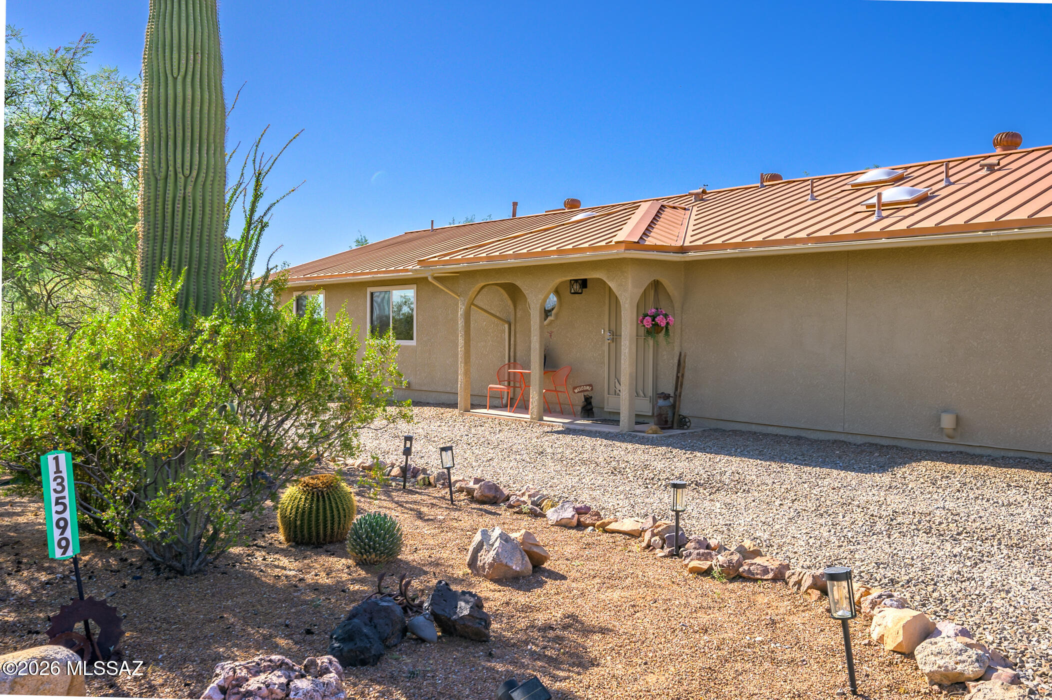 13599 East Rincon Ranch Road Vail, AZ 85641 - Photo 4 of 41 a view of a house with a yard