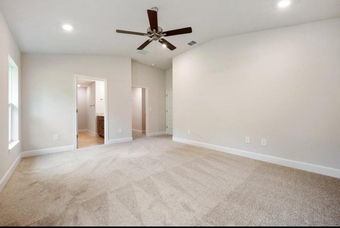 5536 Lugo Street Fort Pierce, FL 34951 - Photo 12 of 33 a view of a livingroom with a ceiling fan and window