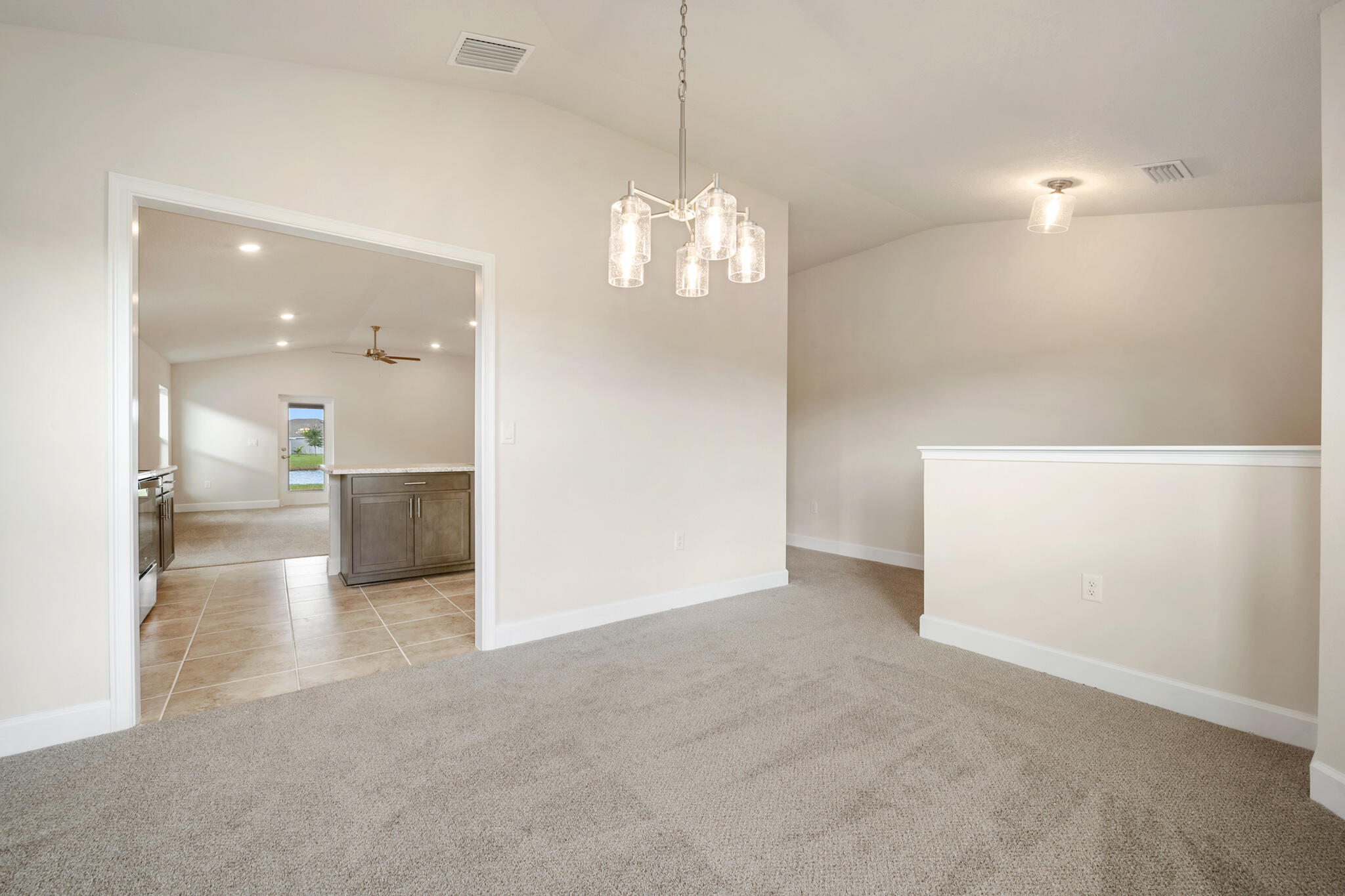 5536 Lugo Street Fort Pierce, FL 34951 - Photo 6 of 33 a view of a kitchen and a chandelier