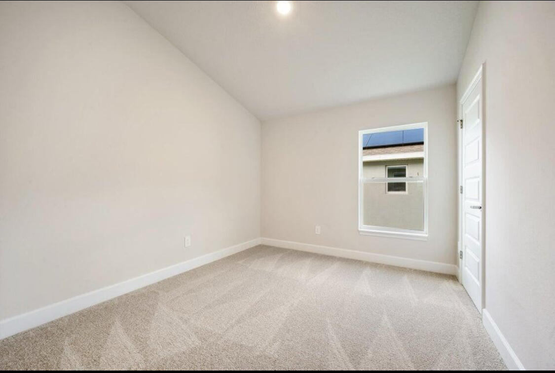 5536 Lugo Street Fort Pierce, FL 34951 - Photo 10 of 33 a view of an empty room with a window