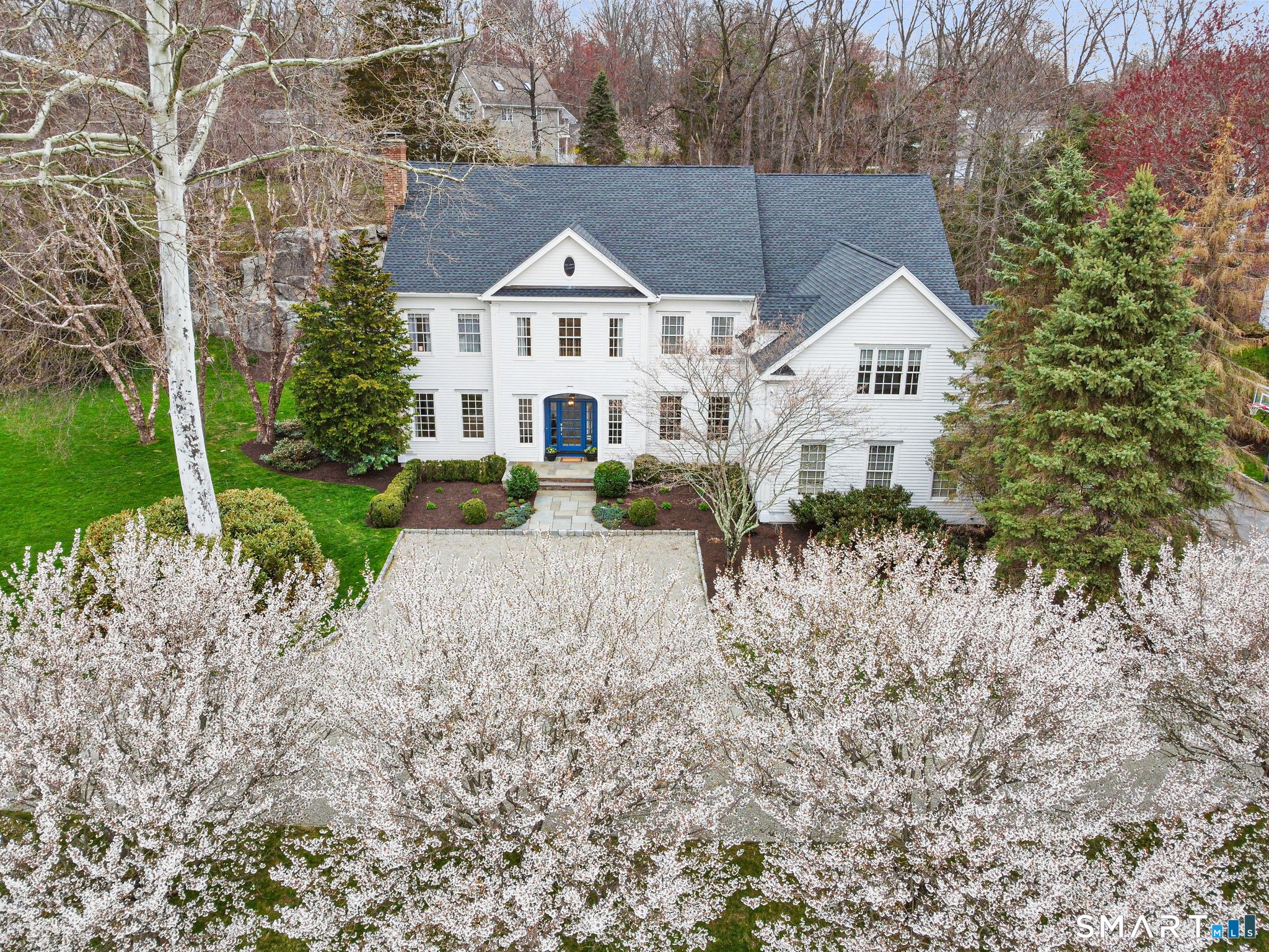 18 Brandon Circle Wilton, CT 06897 - Photo 1 of 40 a view of house with garden