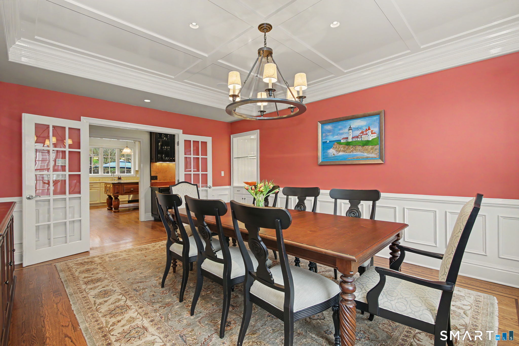 18 Brandon Circle Wilton, CT 06897 - Photo 15 of 40 a view of a dining room with furniture wooden floor and chandelier