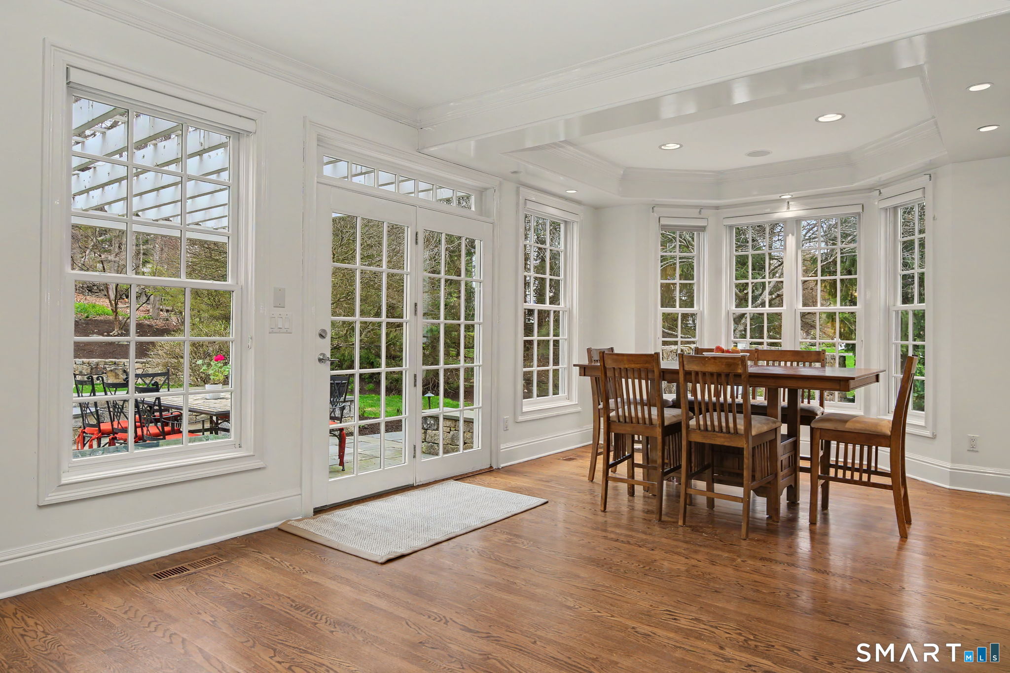 18 Brandon Circle Wilton, CT 06897 - Photo 20 of 40 a dining room with furniture window wooden floor