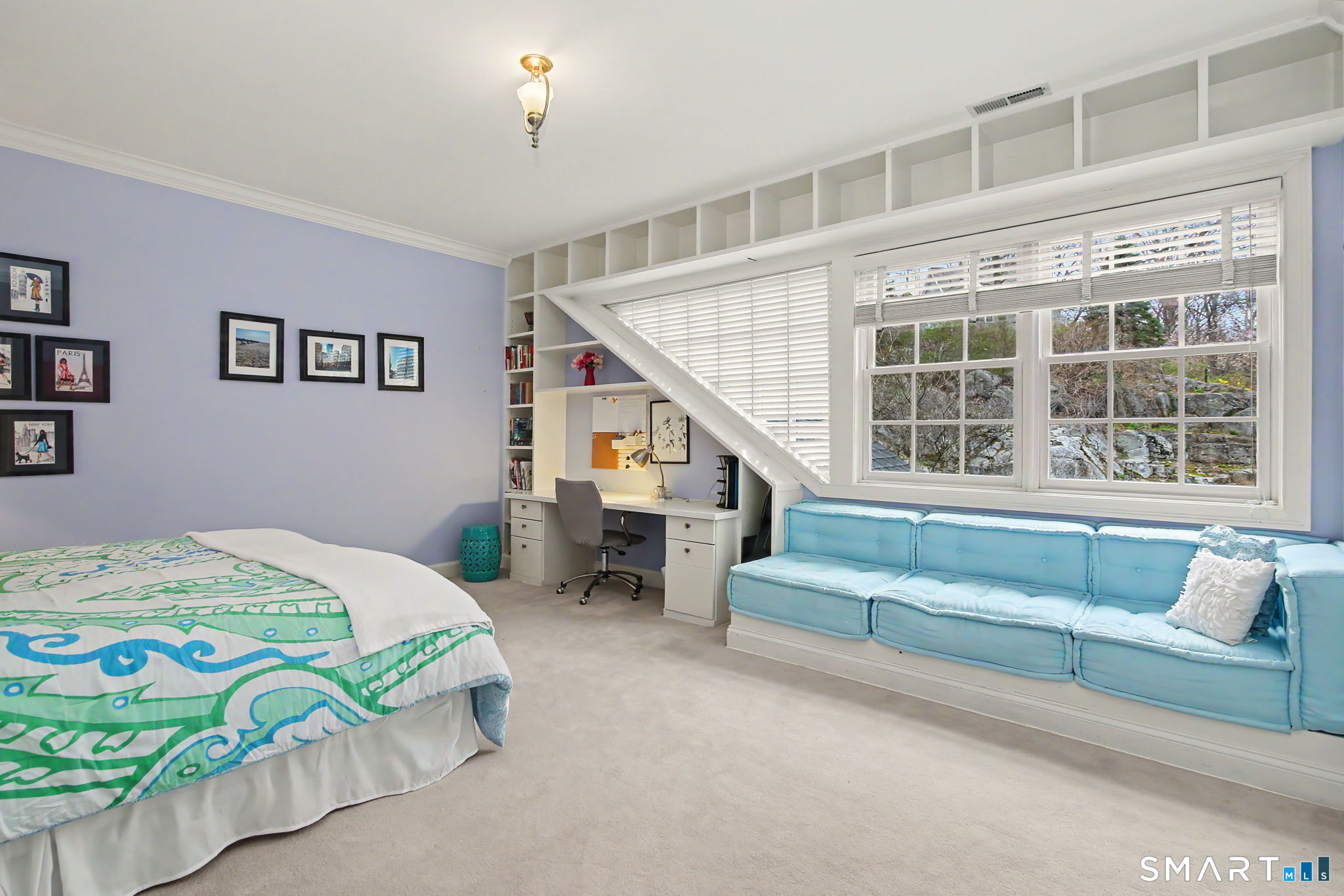 18 Brandon Circle Wilton, CT 06897 - Photo 29 of 40 a bedroom with furniture and a window