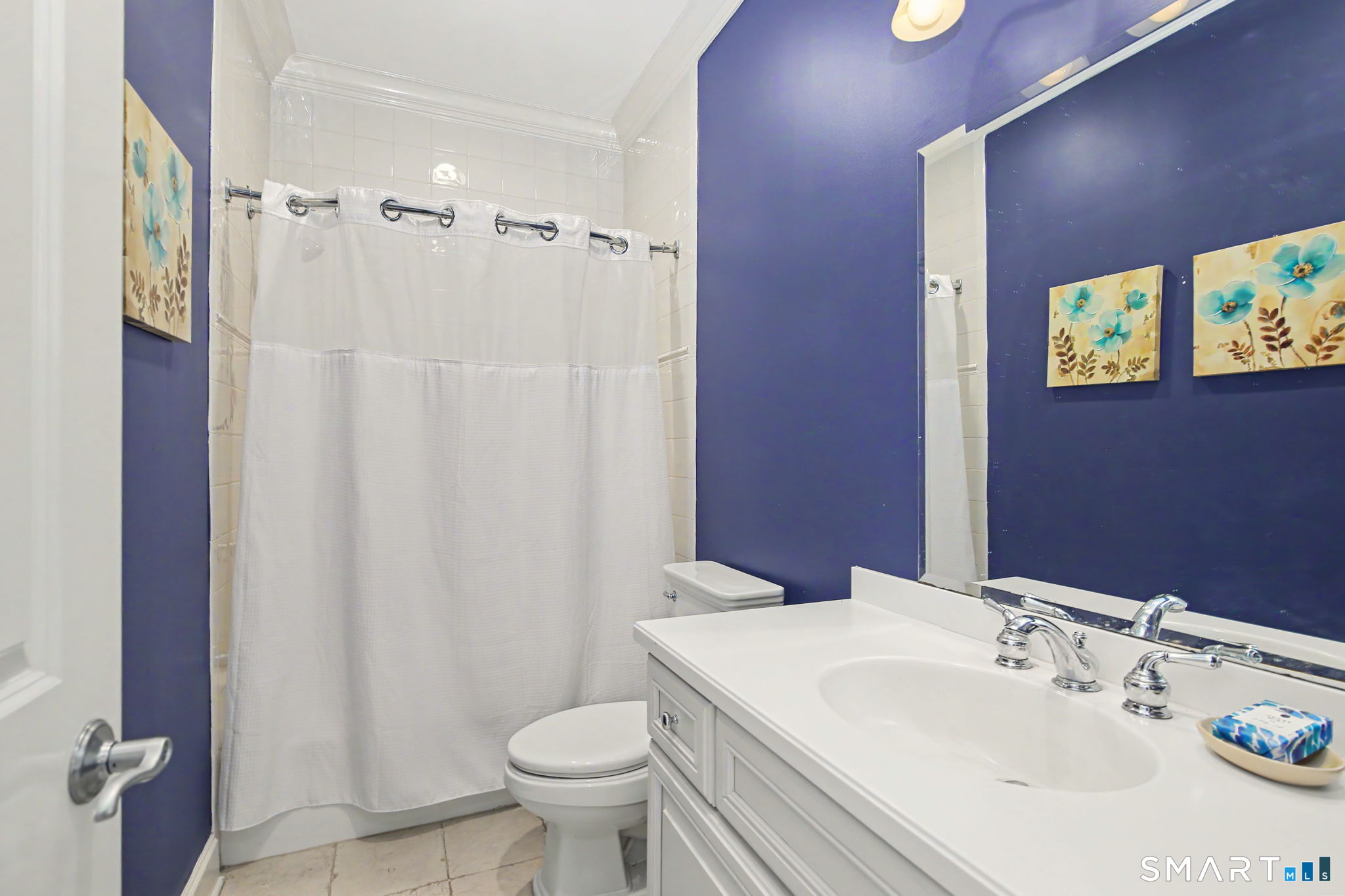 18 Brandon Circle Wilton, CT 06897 - Photo 32 of 40 a bathroom with a sink toilet and shower