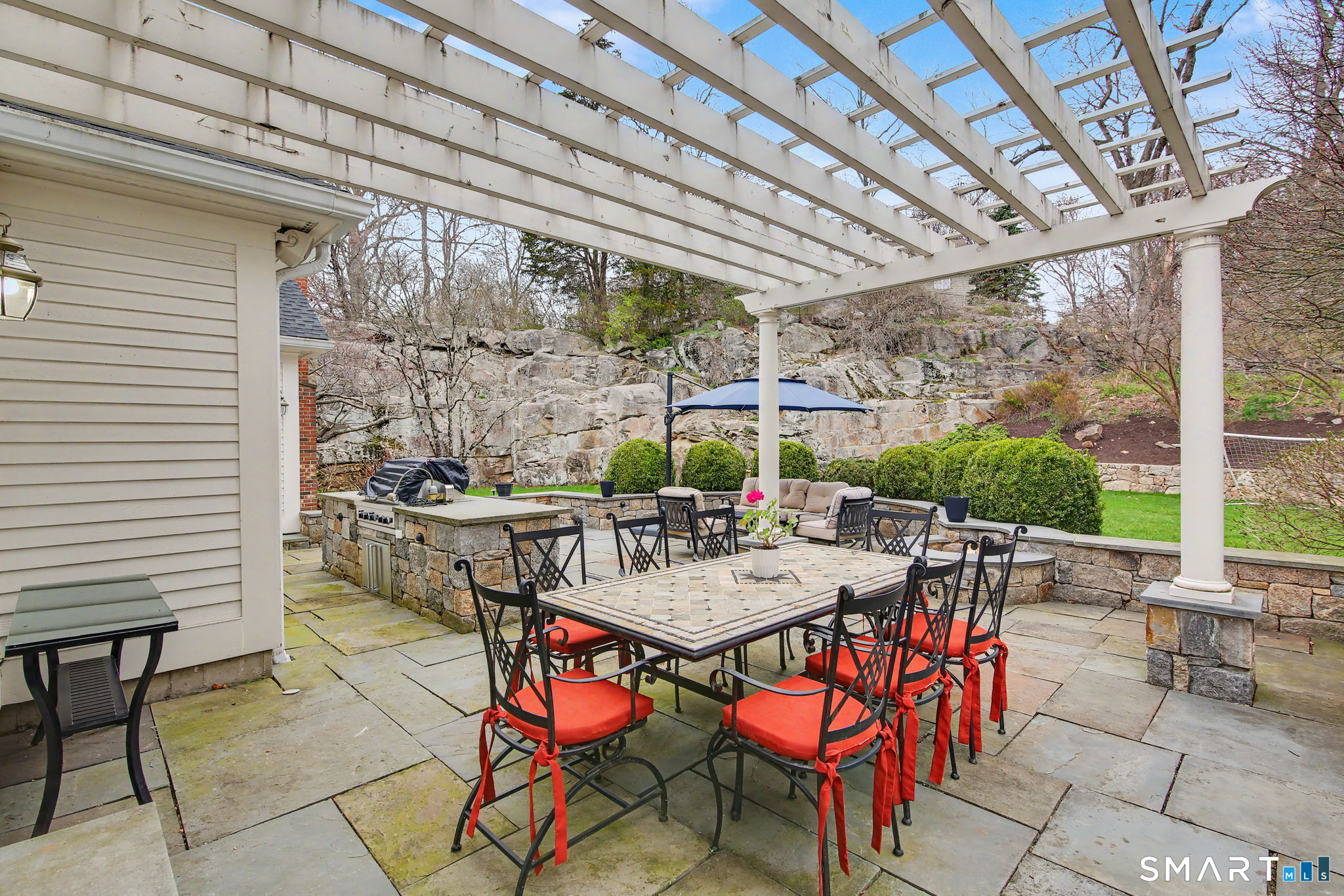 18 Brandon Circle Wilton, CT 06897 - Photo 4 of 40 a outdoor space with furniture