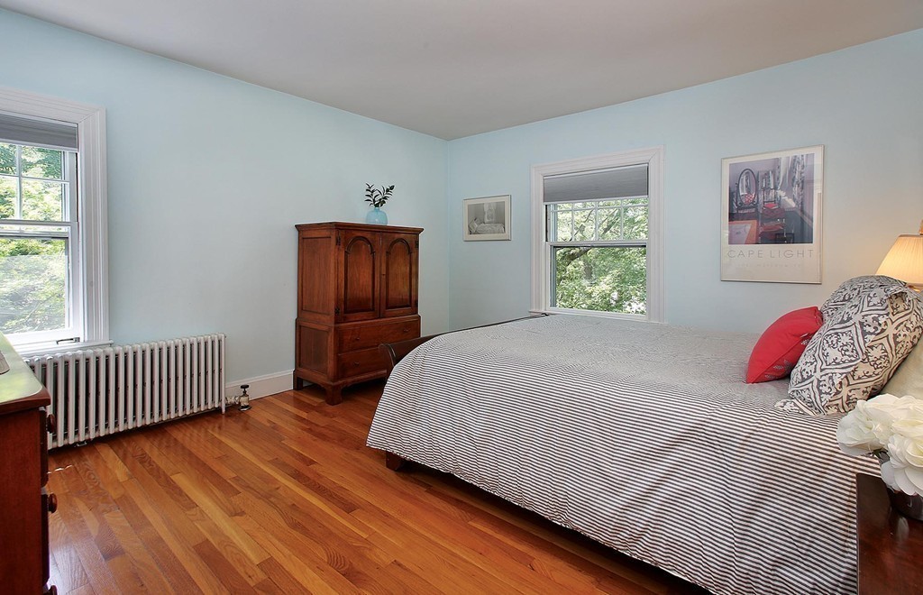 37 Alban Road Newton, MA 02468 - Photo 7 of 10 a bedroom with a bed and wooden floor