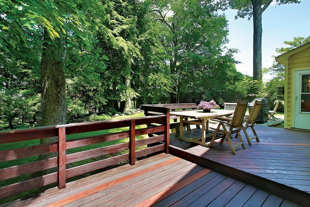 37 Alban Road Newton, MA 02468 - Photo 9 of 10 a view of a chairs and table on the wooden deck