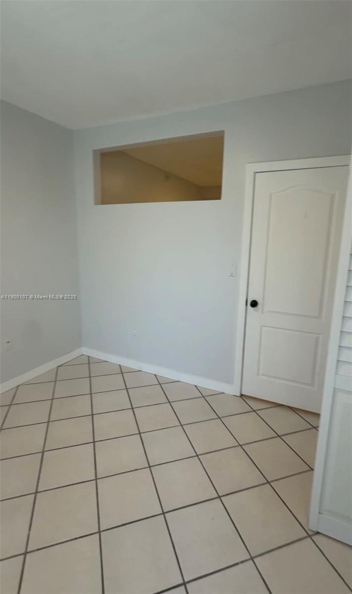 3051 Southwest 27th Avenue, Unit 402 Miami, FL 33133 - Photo 5 of 5 a view of an empty room