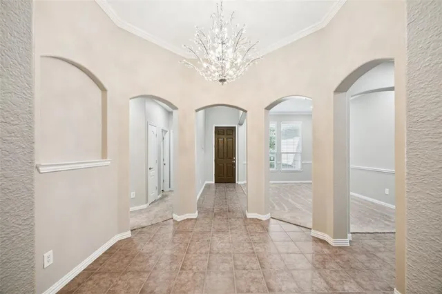 wooden floor in an empty room with a mirror