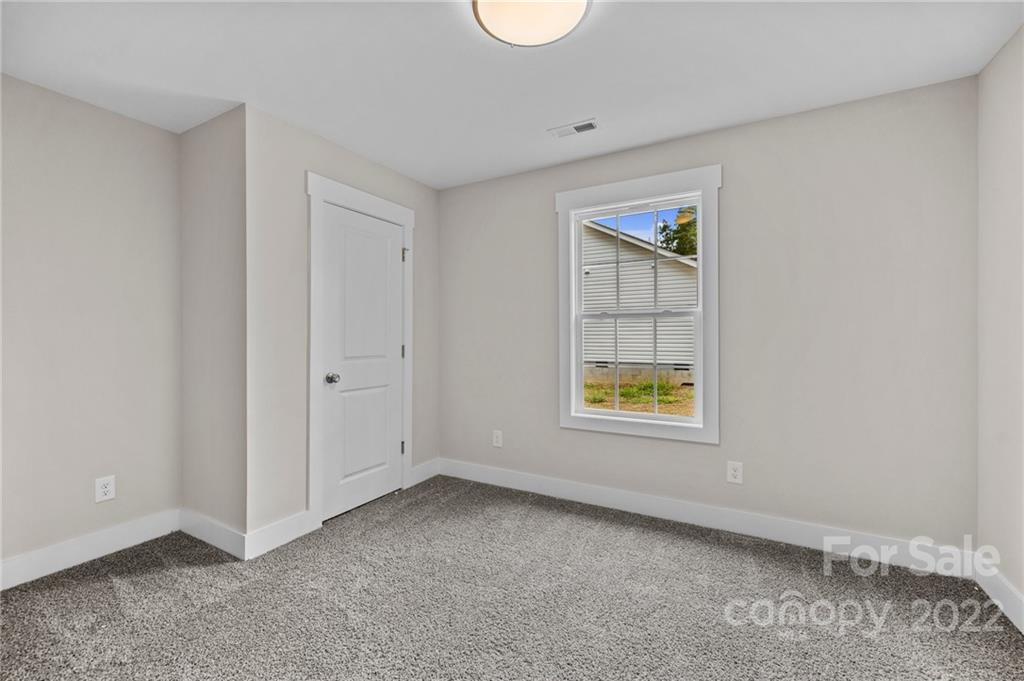 955 Pine Ridge Road, Unit 5 Chester, SC 29706 - Photo 20 of 26 a view of an empty room with a window and bathroom