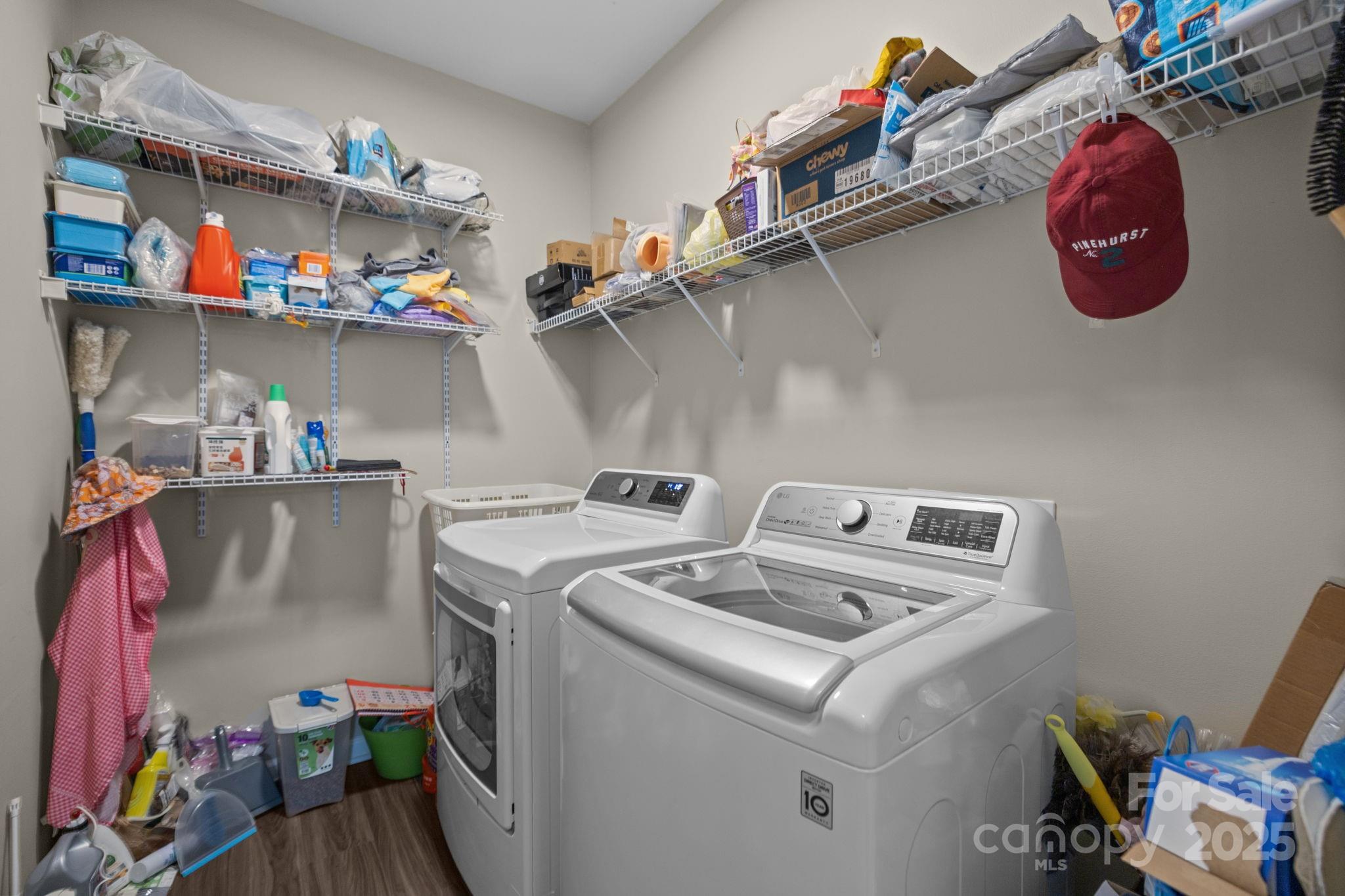 6416 Baltray Road Charlotte, NC 28278 - Photo 17 of 34 a utility room with a lot of cabinet dryer and washer