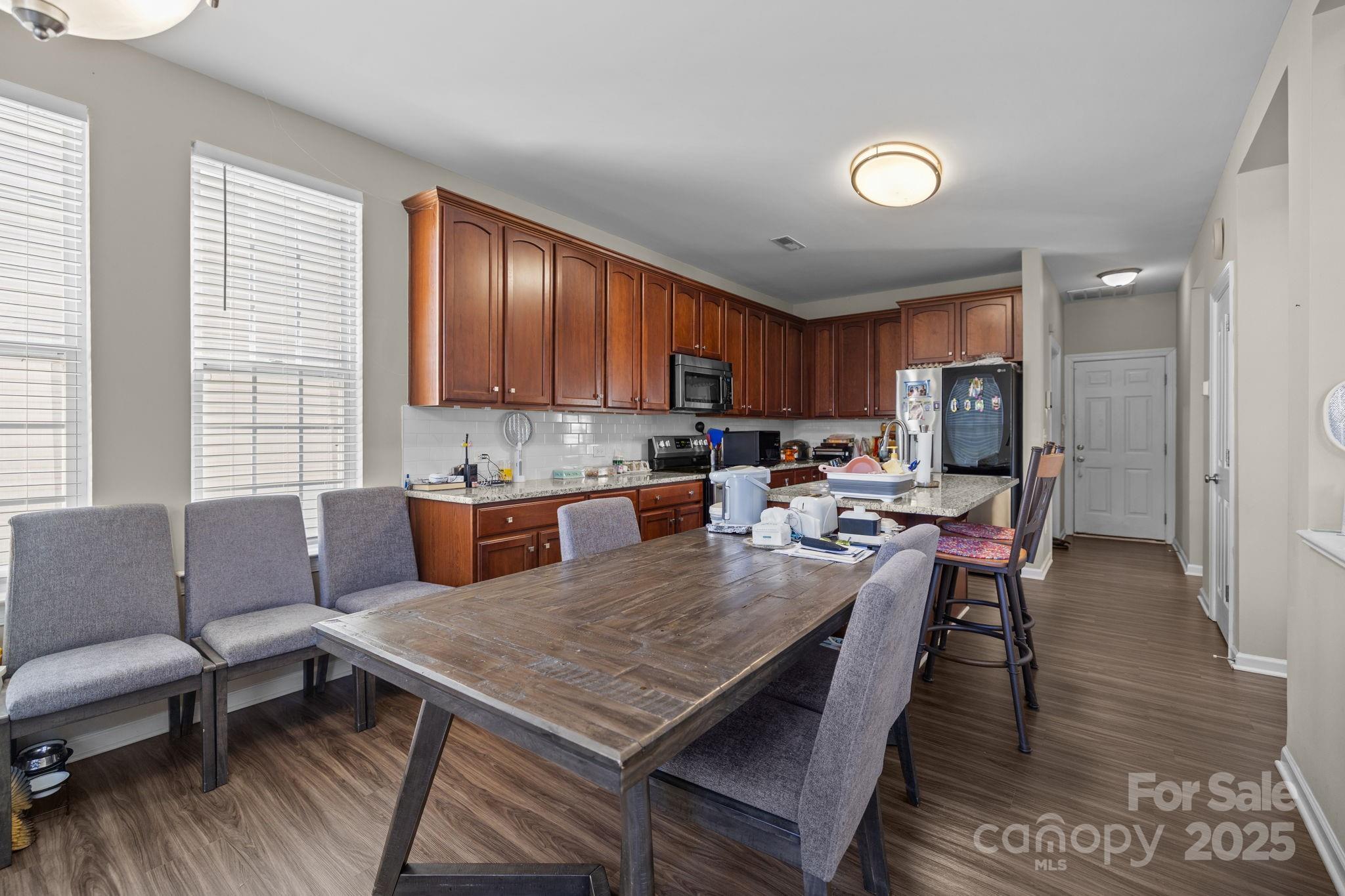 6416 Baltray Road Charlotte, NC 28278 - Photo 10 of 34 a view of kitchen and dining room