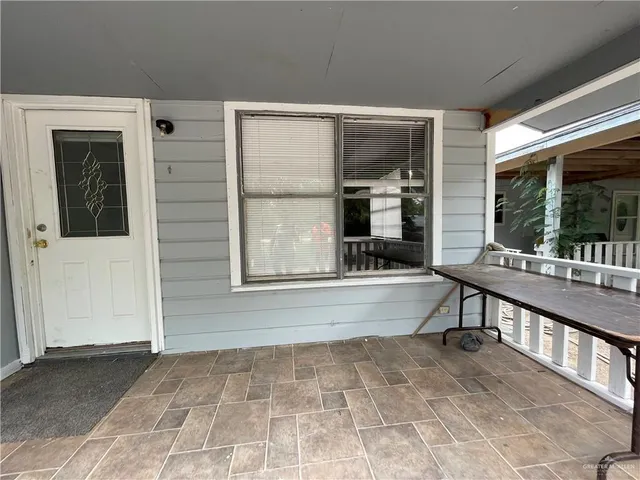 a view of a house with a swimming pool