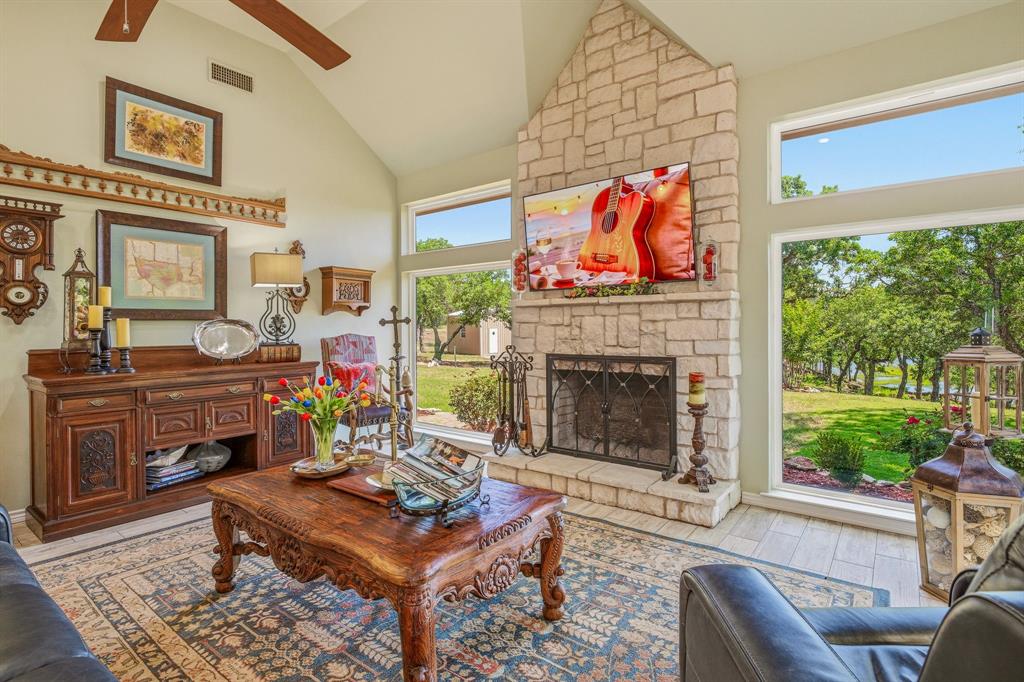 428 Timber Ridge Road Graham, TX 76450 - Photo 12 of 37 Wood burning fireplace.