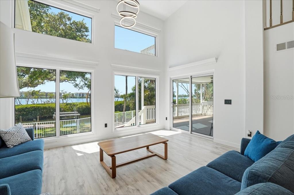 3481 Bayou Sound Longboat Key, FL 34228 - Photo 11 of 79 a living room with furniture and a window