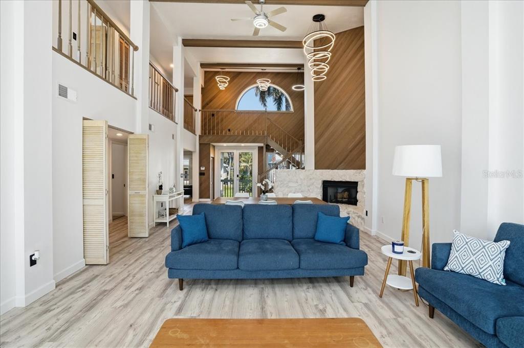 3481 Bayou Sound Longboat Key, FL 34228 - Photo 14 of 79 a living room with furniture and a wooden floor