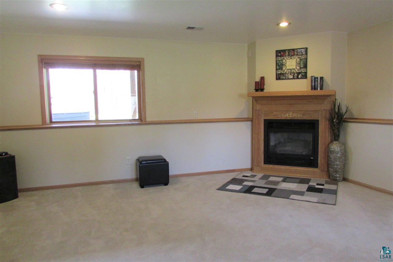 122 Hatinen Road Esko, MN 55733 - Photo 16 of 31 Family room with gas fireplace