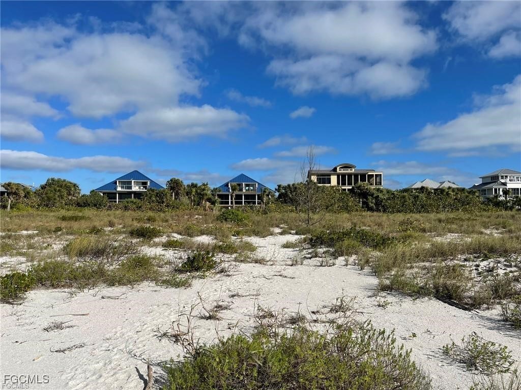 640 Gulf Lane, Unit 3 Captiva, FL 33924 - Photo 18 of 50 a view of a lake with a beach