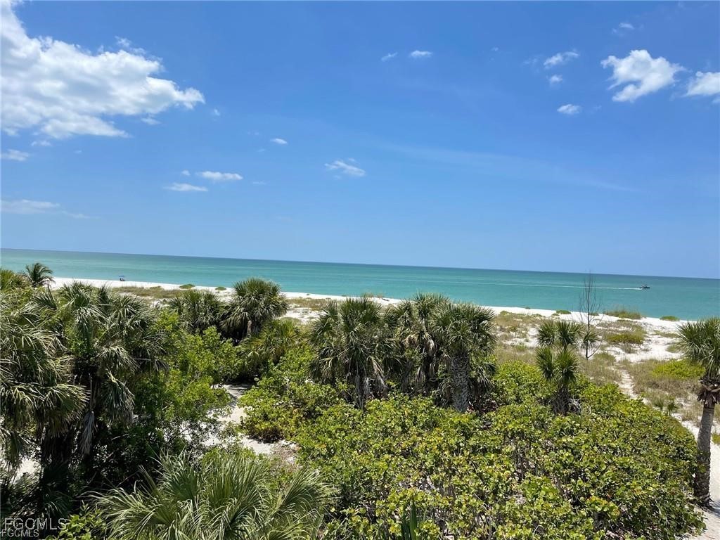 640 Gulf Lane, Unit 3 Captiva, FL 33924 - Photo 46 of 50 a view of yard and an ocean