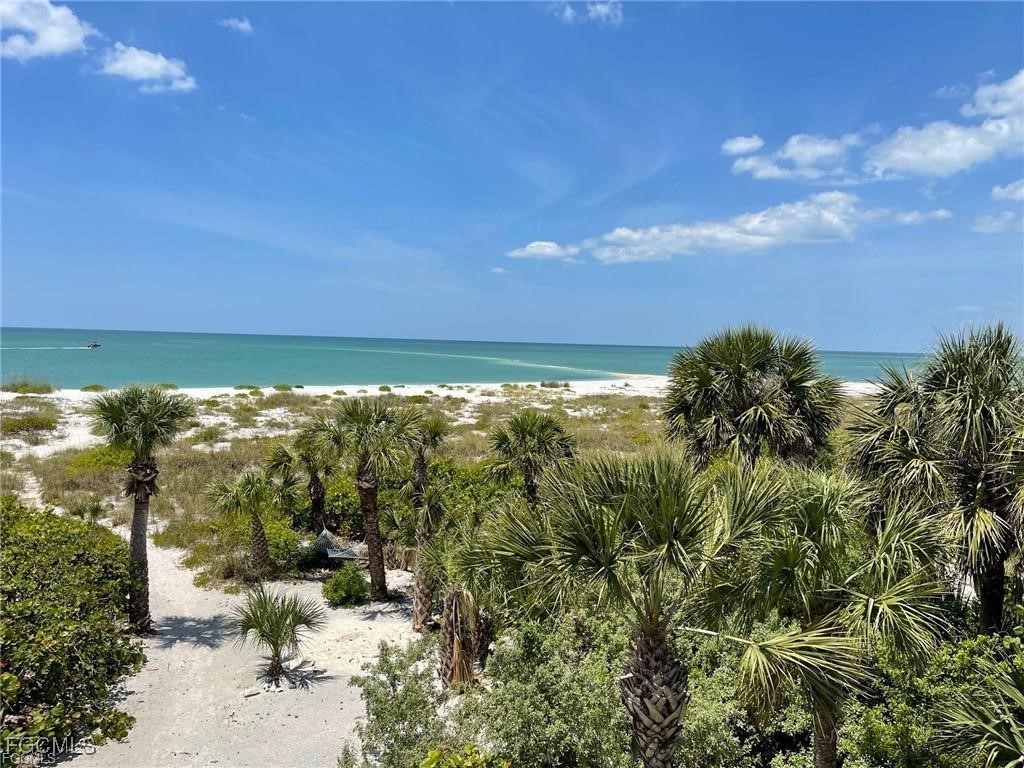 640 Gulf Lane, Unit 3 Captiva, FL 33924 - Photo 7 of 50 a view of a yard with an outdoor space