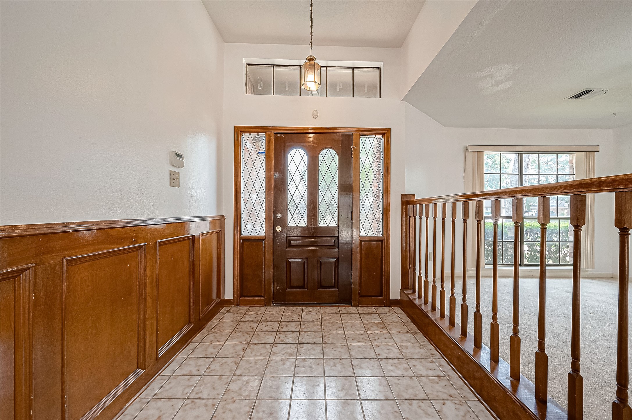 14818 La Rana Drive Houston, TX 77083 - Photo 6 of 50 a view of entryway with wooden floor