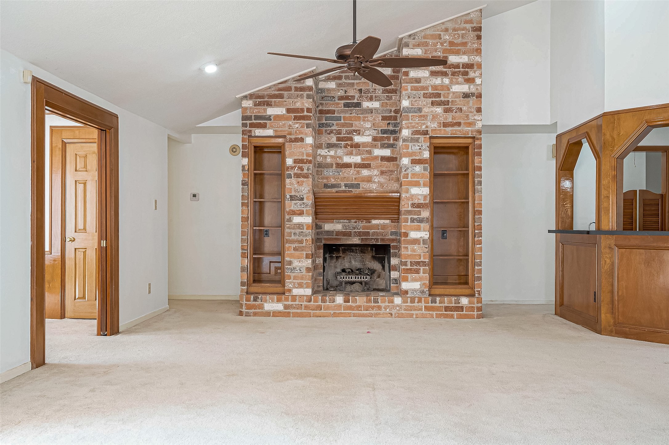 14818 La Rana Drive Houston, TX 77083 - Photo 10 of 50 a water heater room with a fireplace