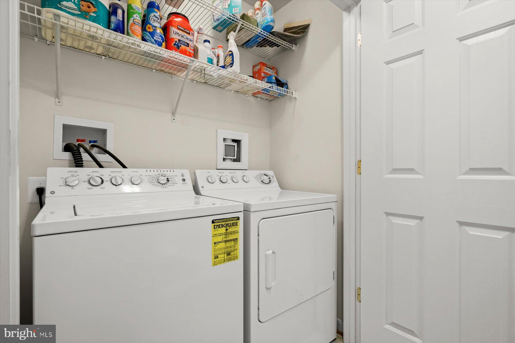 2044 Astilbe Way, Unit 2044 Odenton, MD 21113 - Photo 26 of 56 a utility room with dryer and washer