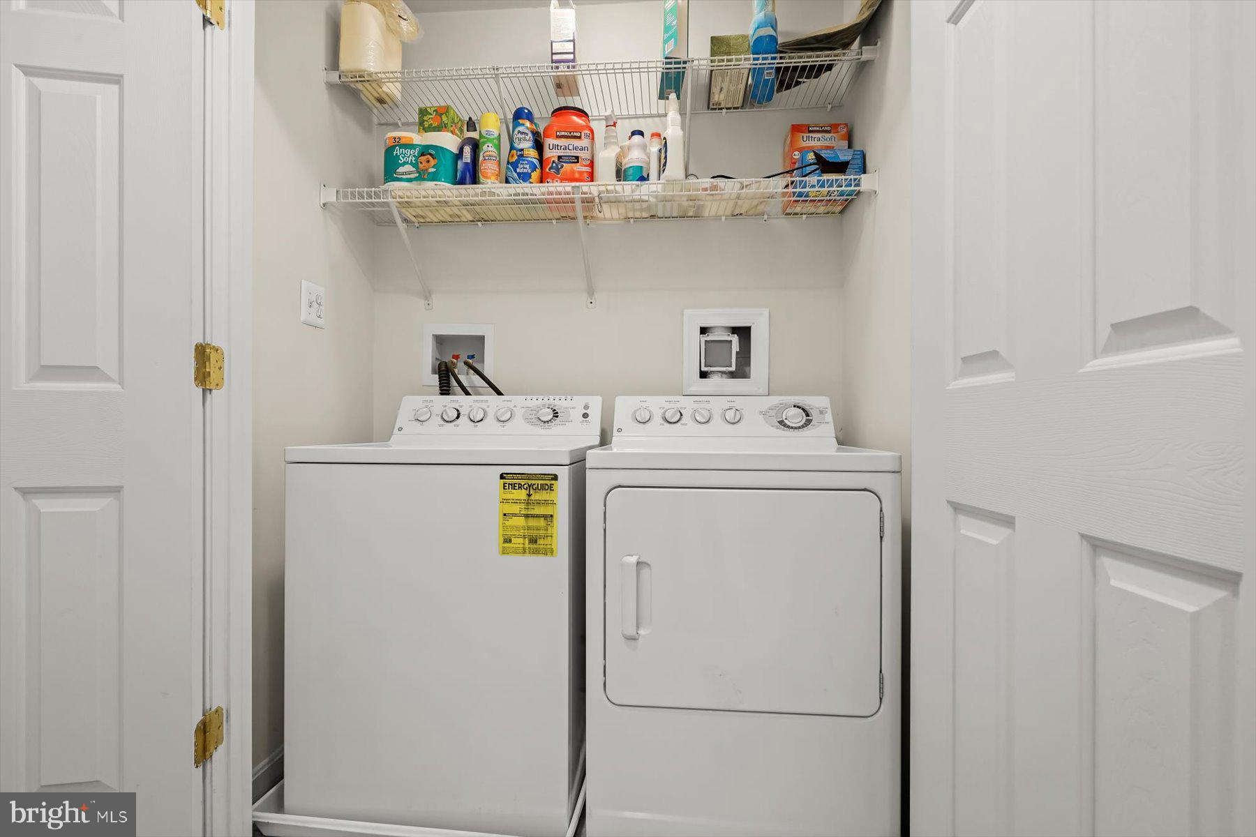 2044 Astilbe Way, Unit 2044 Odenton, MD 21113 - Photo 27 of 56 a utility room with dryer and washer