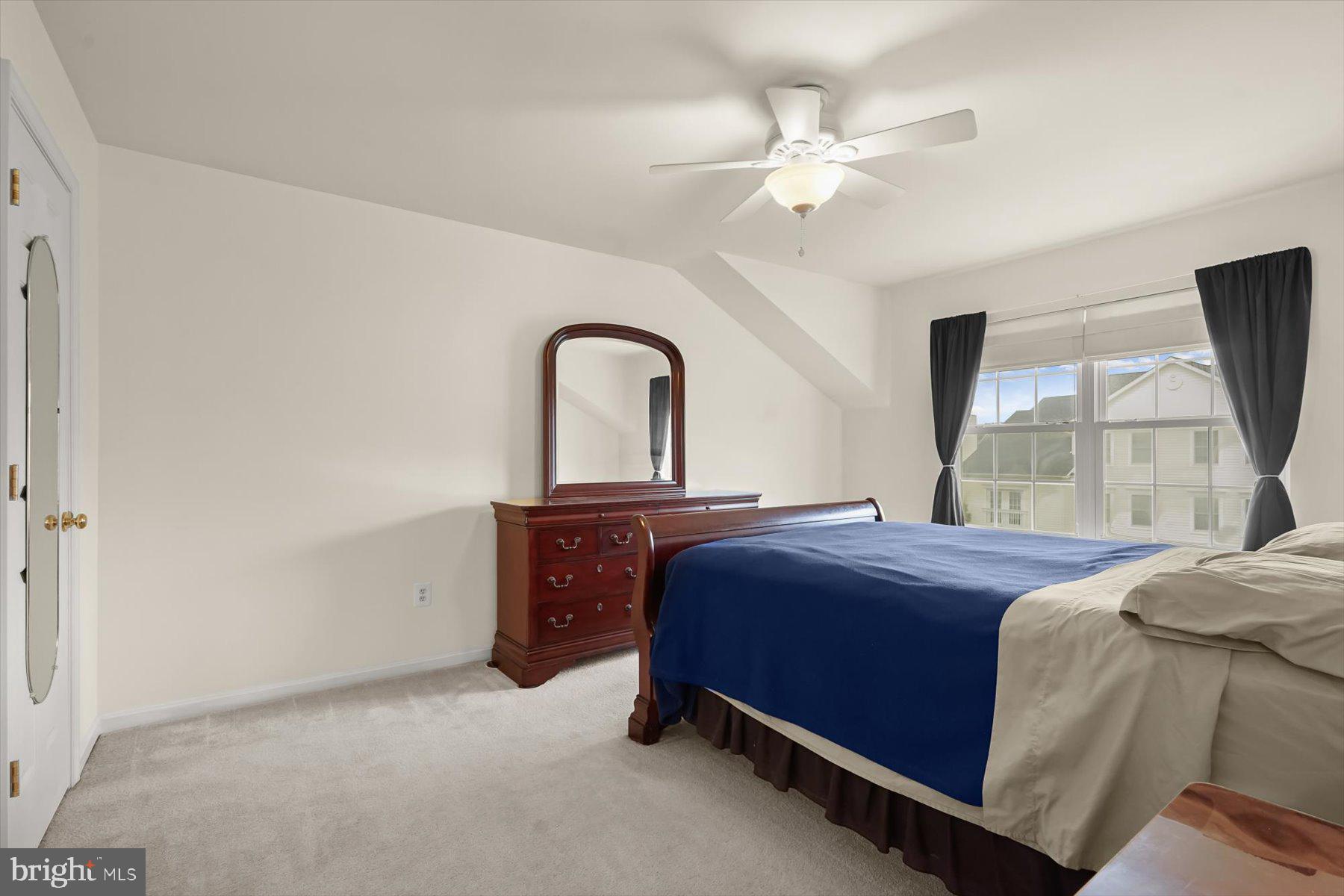 2044 Astilbe Way, Unit 2044 Odenton, MD 21113 - Photo 32 of 56 a bedroom with a bed and window