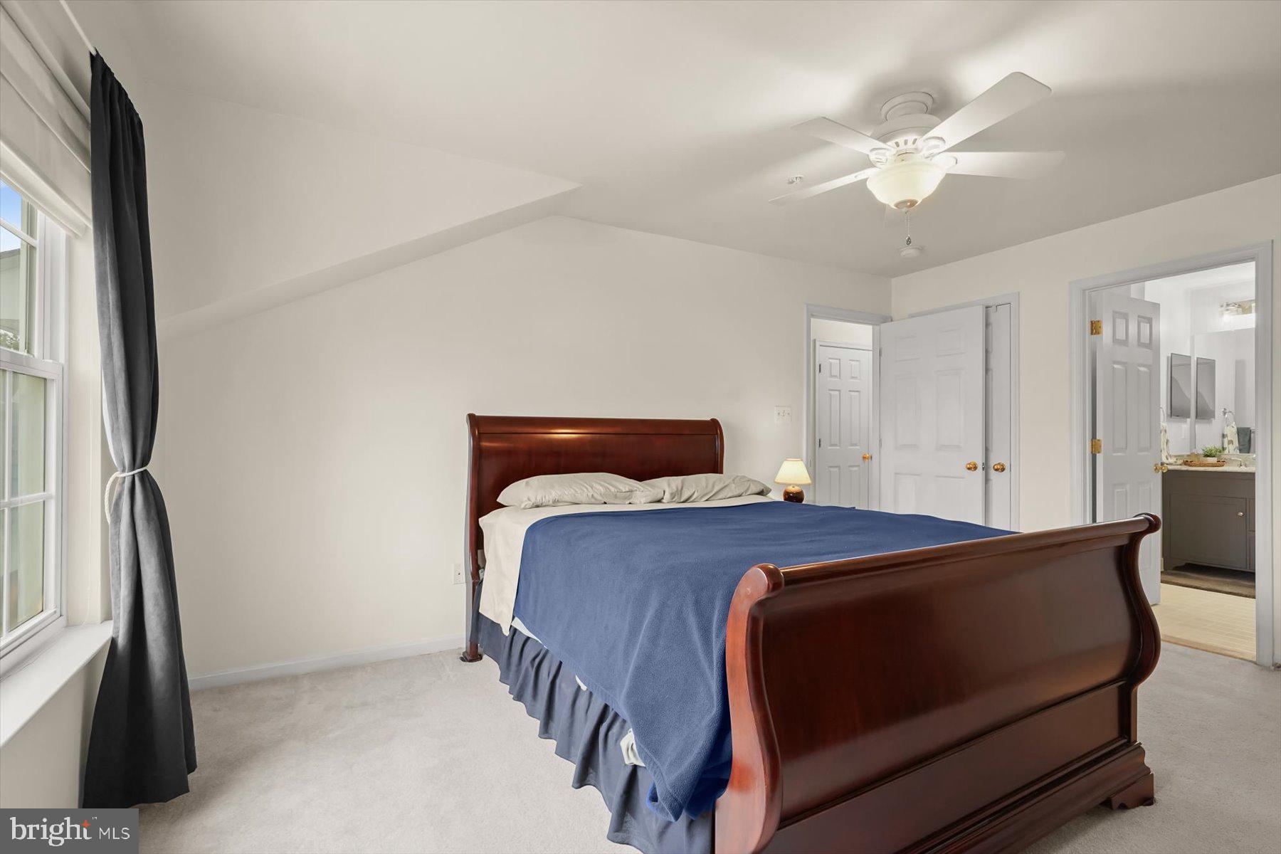 2044 Astilbe Way, Unit 2044 Odenton, MD 21113 - Photo 37 of 56 a bedroom with a bed and closet
