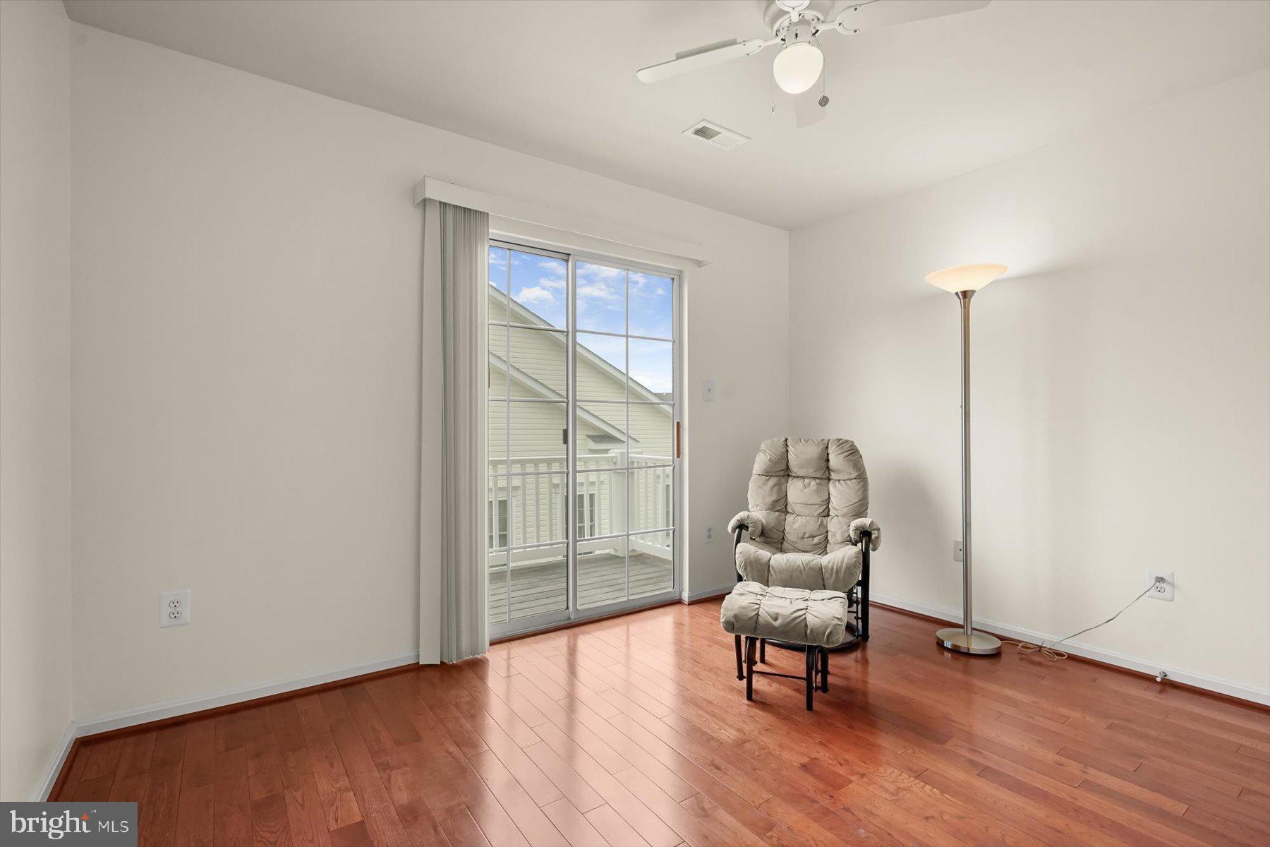 2044 Astilbe Way, Unit 2044 Odenton, MD 21113 - Photo 41 of 56 a living room with furniture and a window