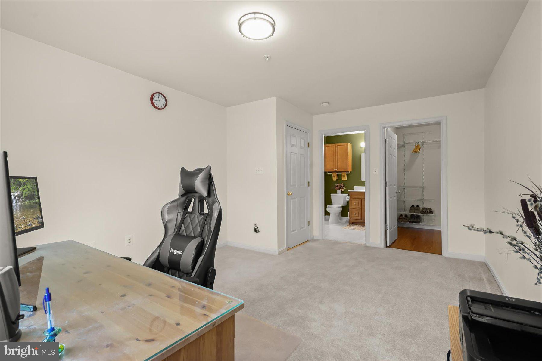 2044 Astilbe Way, Unit 2044 Odenton, MD 21113 - Photo 44 of 56 a view of a livingroom with furniture and bathroom