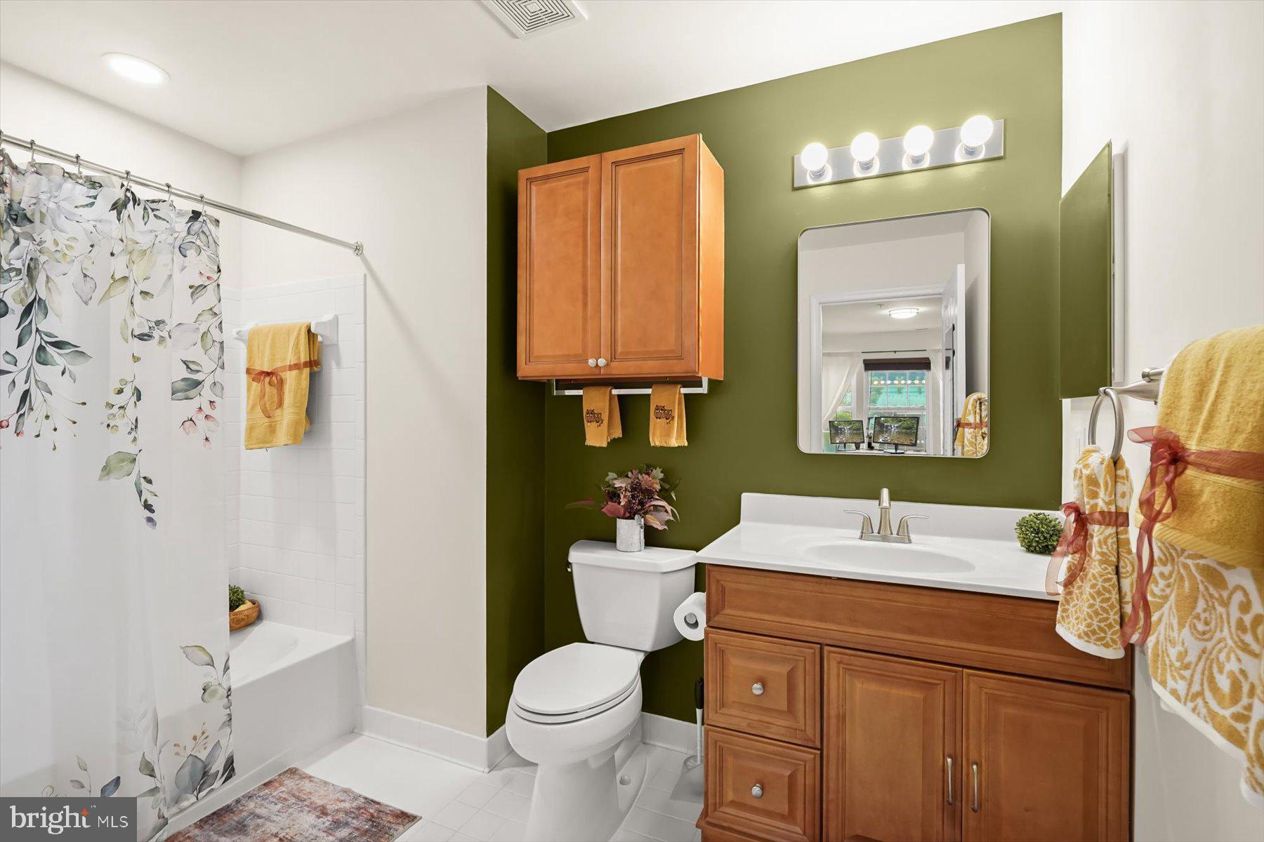 2044 Astilbe Way, Unit 2044 Odenton, MD 21113 - Photo 48 of 56 a bathroom with a sink toilet and shower