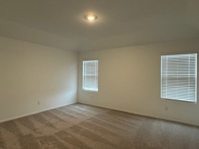 222 Carmello Kyle, TX 78640 - Photo 16 of 30 an empty room with a window