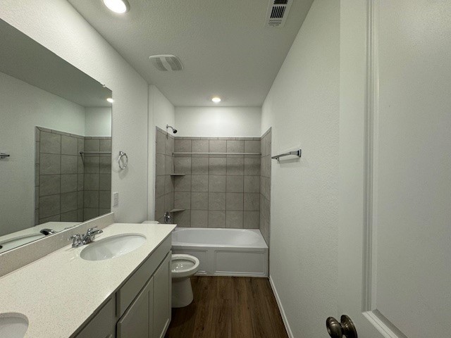222 Carmello Kyle, TX 78640 - Photo 21 of 30 a bathroom with a sink a toilet and shower