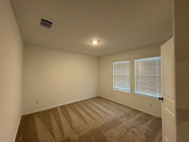 222 Carmello Kyle, TX 78640 - Photo 24 of 30 an empty room with a windows
