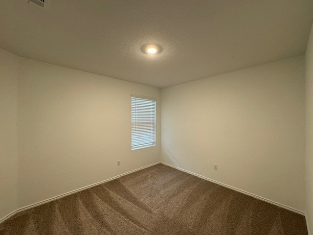 222 Carmello Kyle, TX 78640 - Photo 25 of 30 an empty room with a window