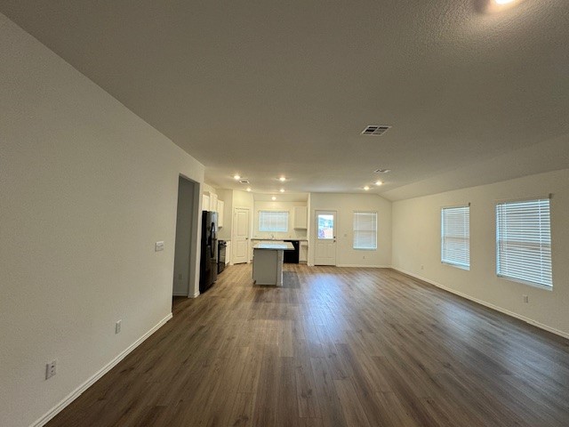 222 Carmello Kyle, TX 78640 - Photo 26 of 30 a view of a livingroom with wooden floor