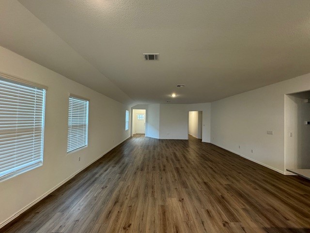 222 Carmello Kyle, TX 78640 - Photo 30 of 30 a view of an empty room with wooden floor and window