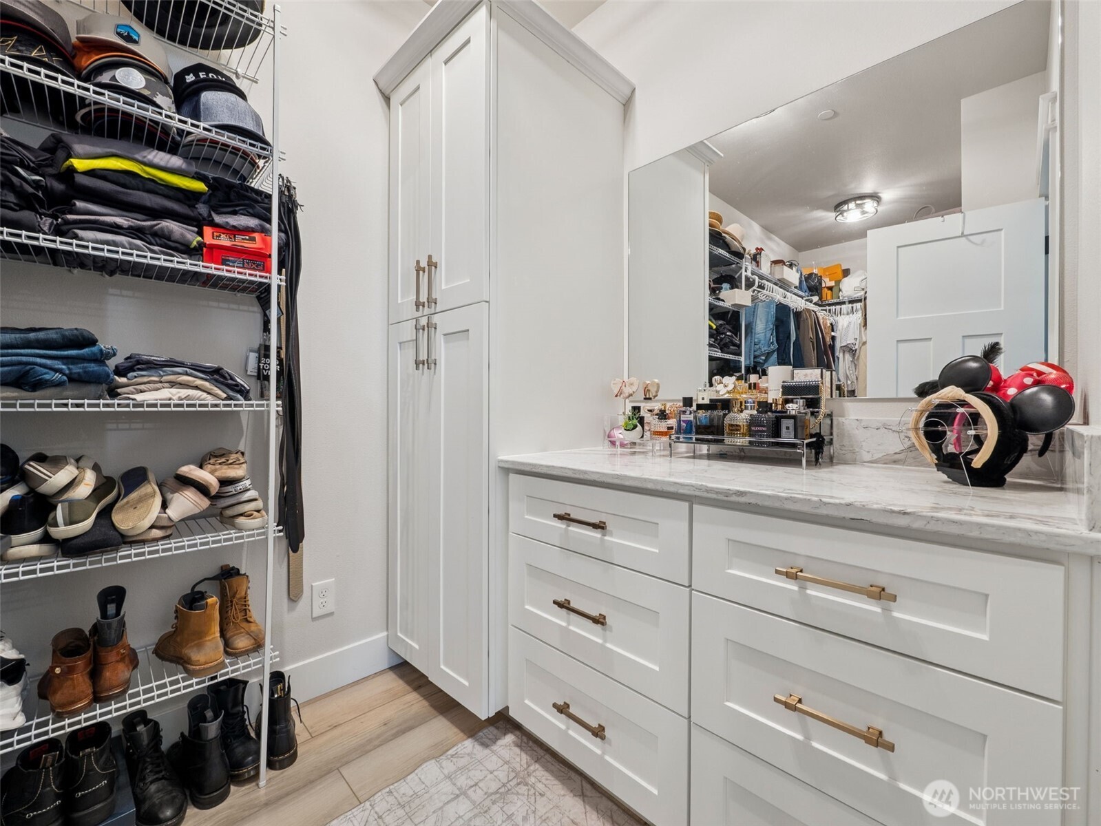 917 Tiedman Road Northwest Lakebay, WA 98349 - Photo 20 of 39 a view of walk in closet with clothes and shoes