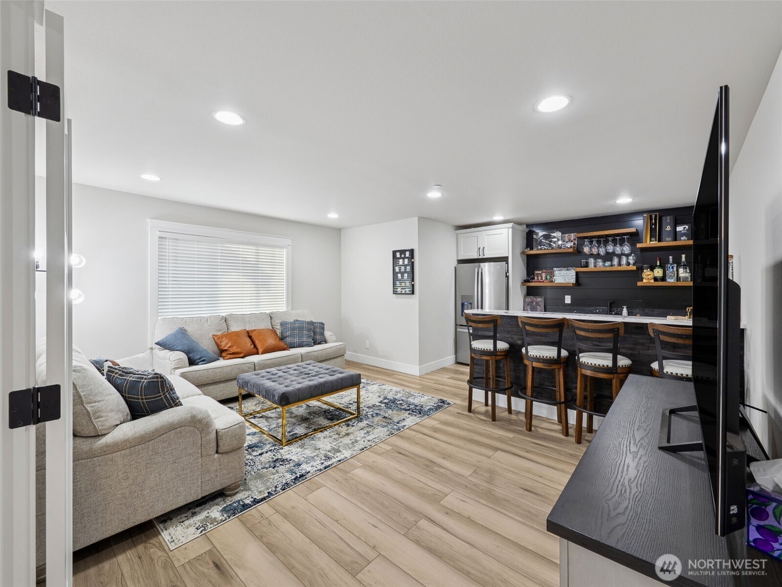 917 Tiedman Road Northwest Lakebay, WA 98349 - Photo 21 of 39 a living room with lots of furniture and kitchen view