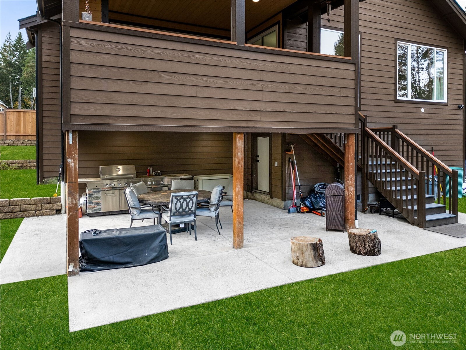 917 Tiedman Road Northwest Lakebay, WA 98349 - Photo 30 of 39 a view of a backyard with sitting area and slide