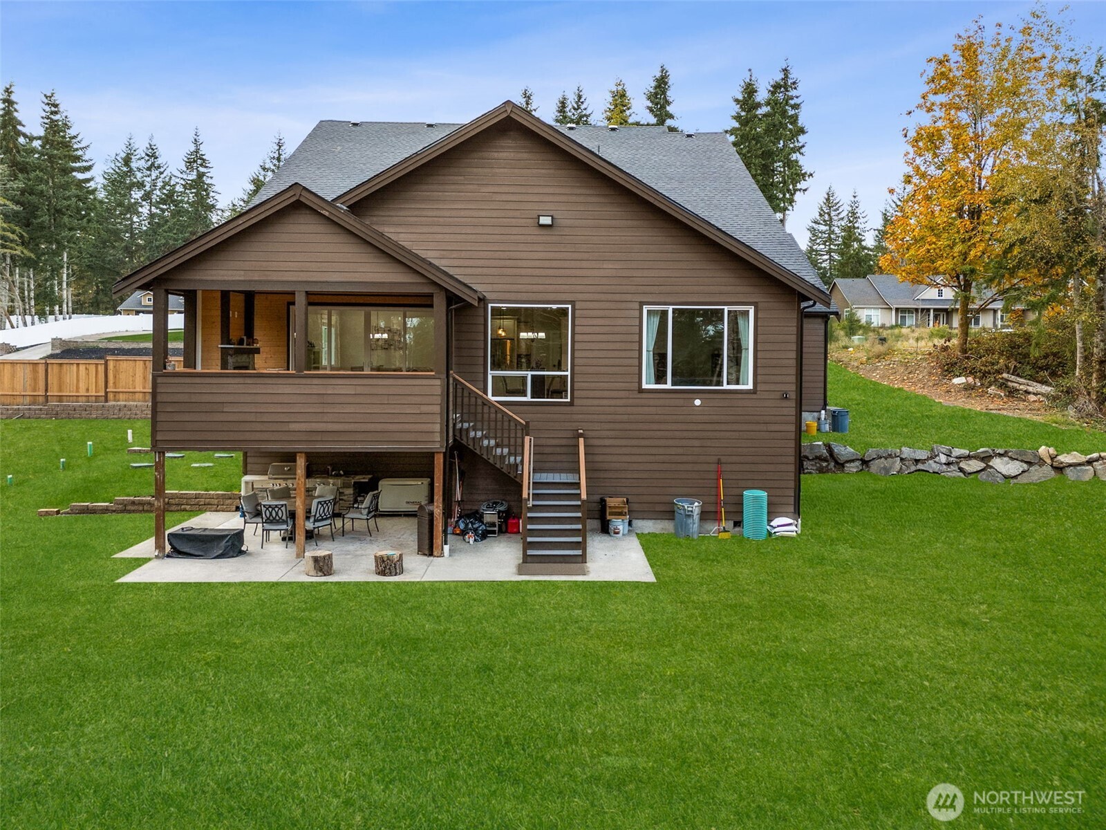 917 Tiedman Road Northwest Lakebay, WA 98349 - Photo 32 of 39 a front view of a house with garden