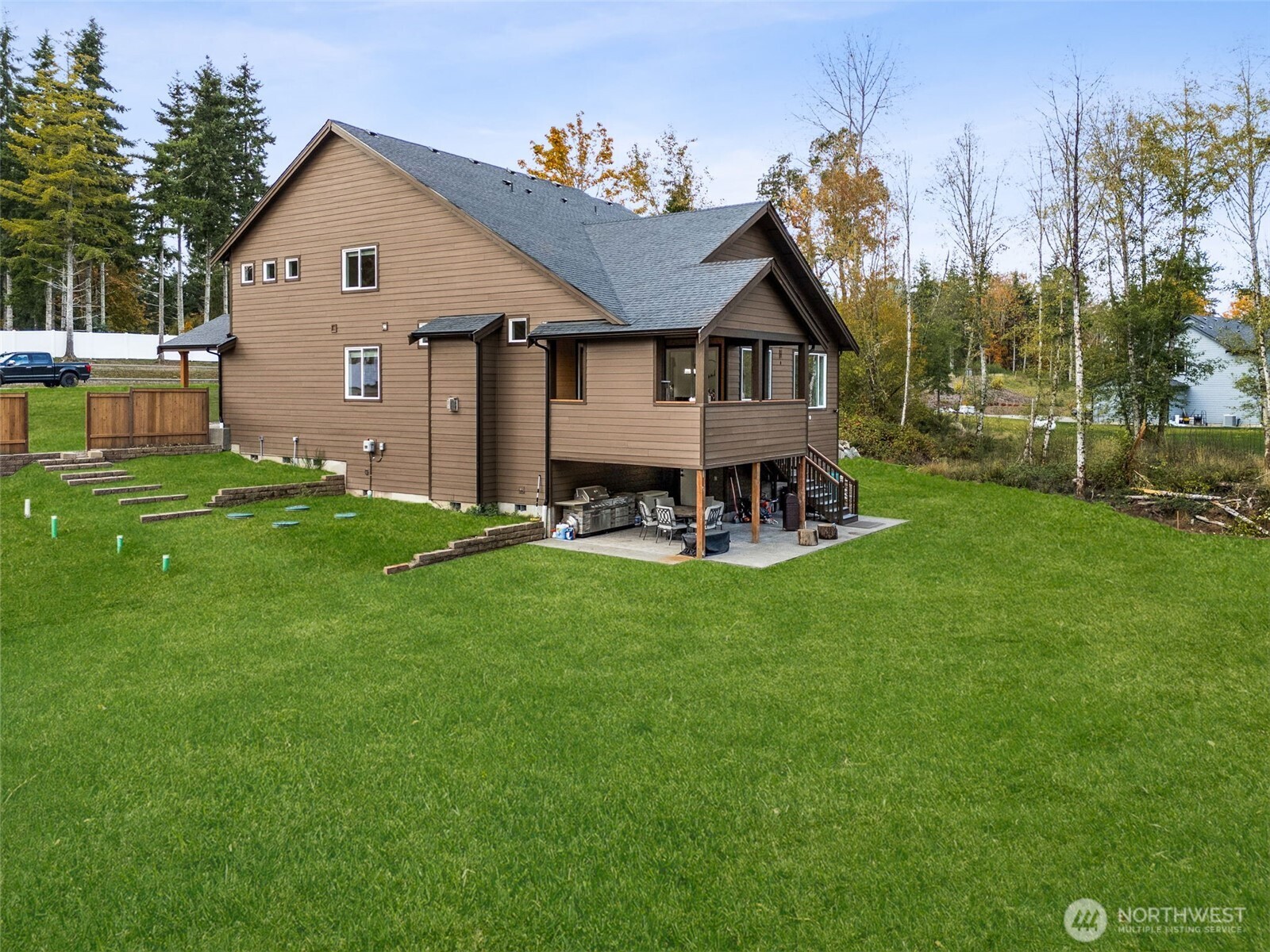 917 Tiedman Road Northwest Lakebay, WA 98349 - Photo 34 of 39 a front view of a house with yard and green space