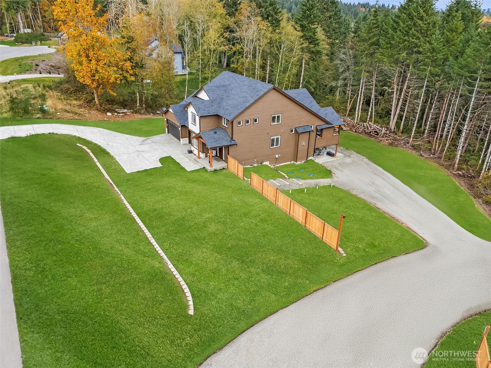 917 Tiedman Road Northwest Lakebay, WA 98349 - Photo 36 of 39 a aerial view of a house with a yard